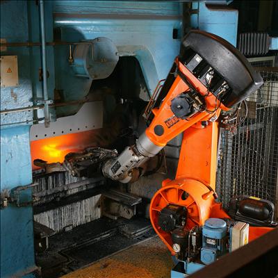 Industrial robot working in foundry